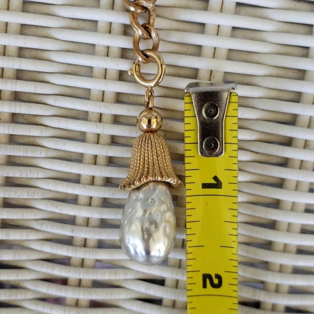 Sarah Coventry Gold-tone, Faux Pearl necklace.